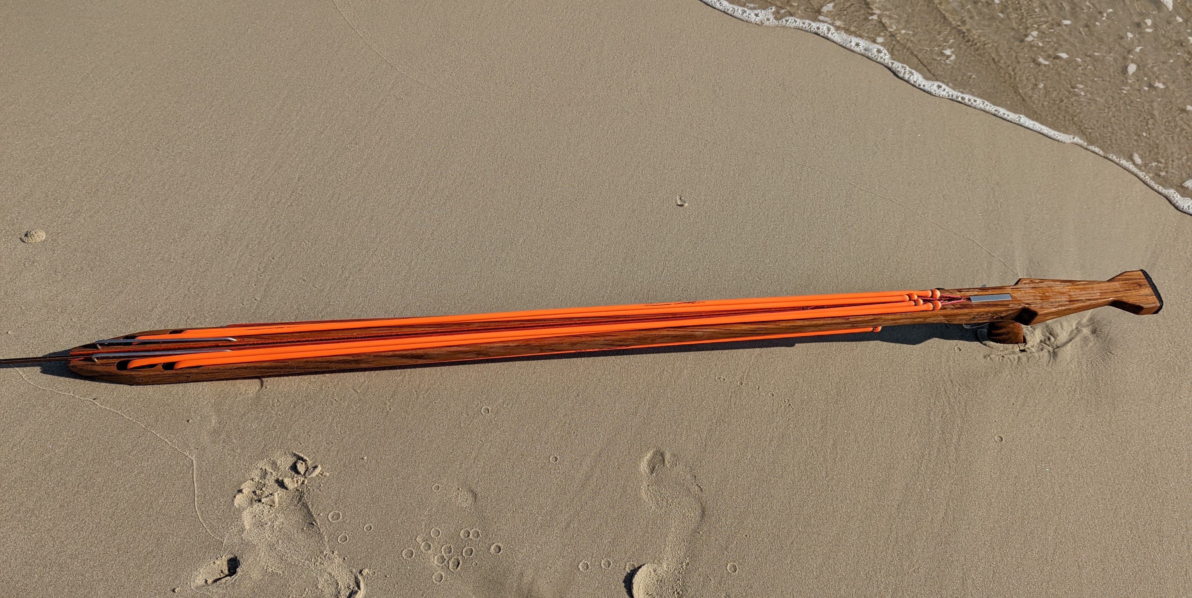 Custom speargun on sand